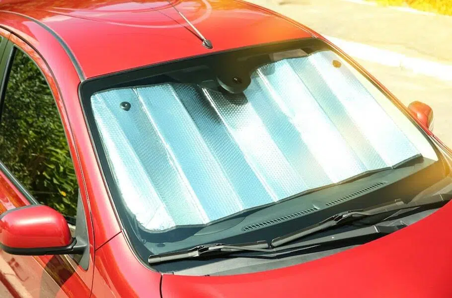 car under sun shutterstock 1898642056 min